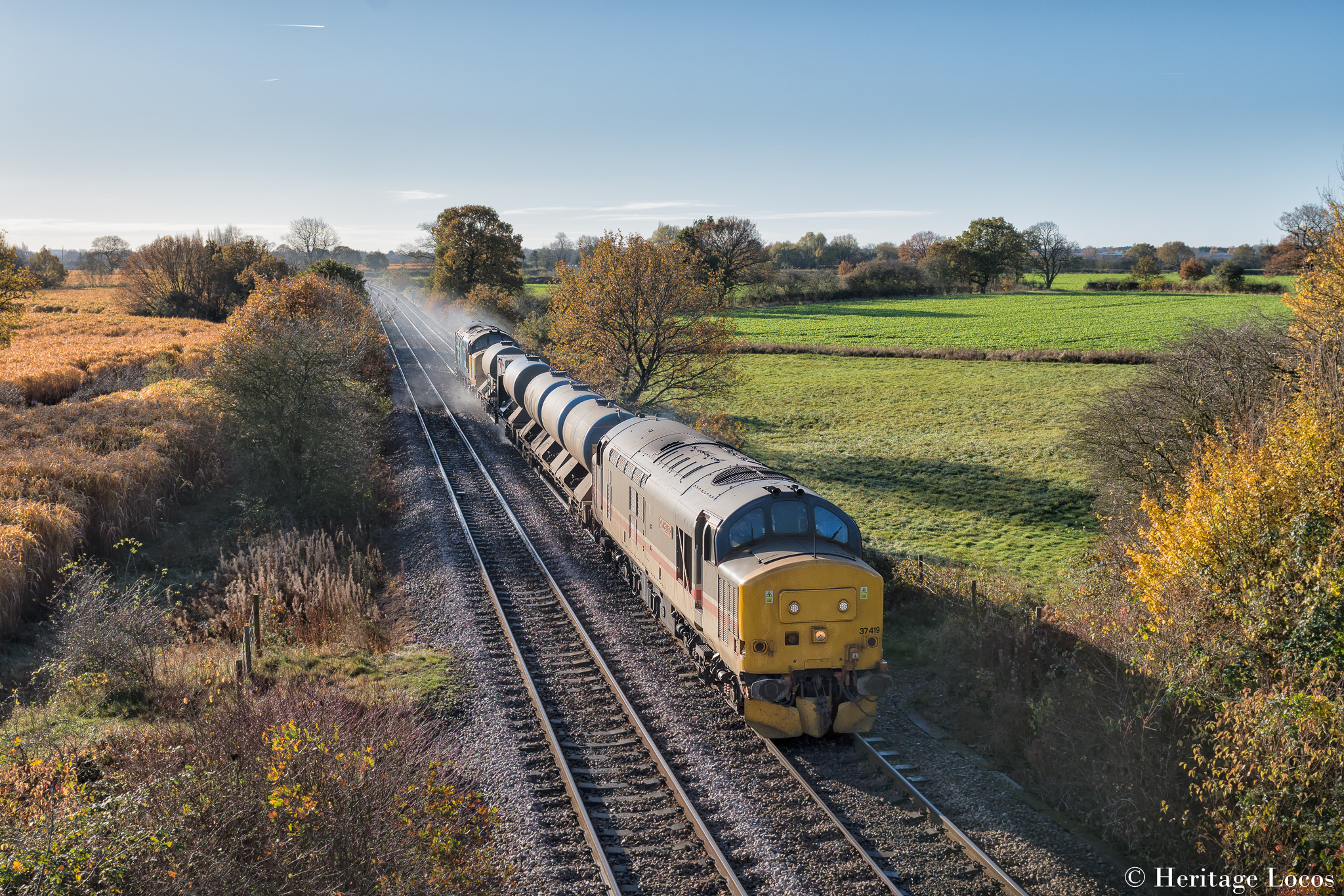 37419 leads 37401 on the 3J51 York Thrail/York Thrail RHTT working round the Wolds coast through Clifton, York.