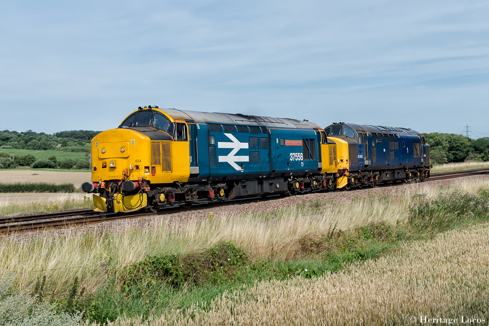 37558 (37424) "Avro Vulcan XH558" (37424 carrying 37558 to commemorate XH558) and 37422 "Victorious" on the 0Z37 York Parcel Sidings to Crewe Wagon Shop repositioning move