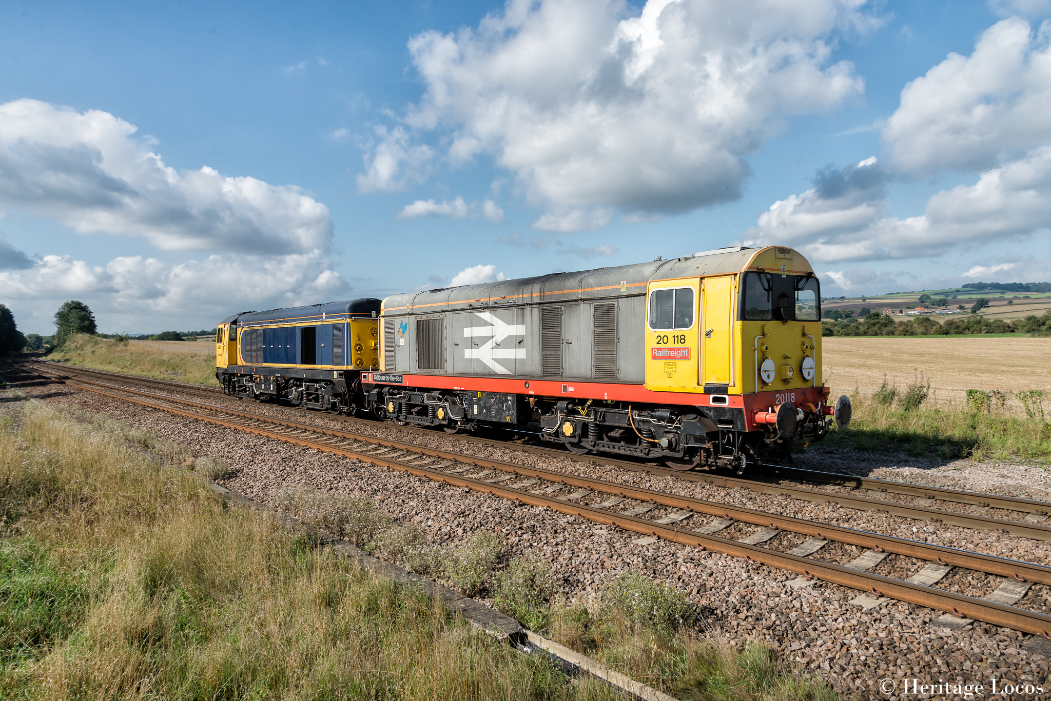 Class 20 20118 and 20901 pass Slitting Mills crossing working 0Z70 Derby Chaddesden sidings to Worksop Down Yard after coming off hire.
