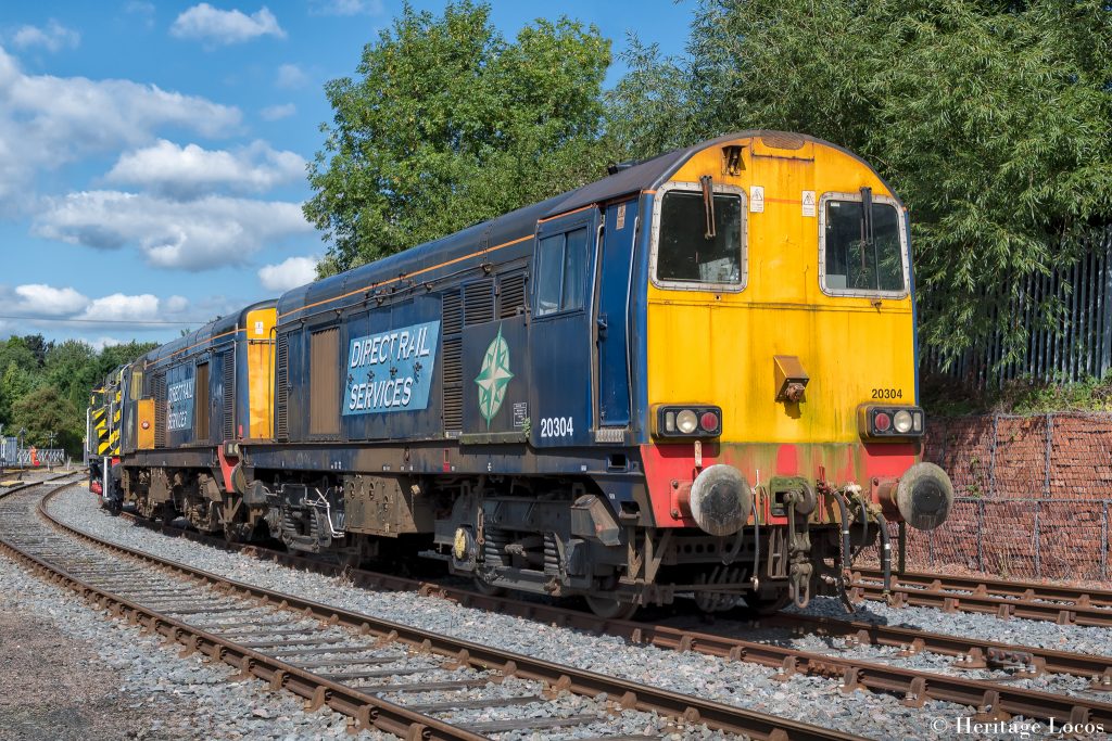 DRS Class 20 20304 stands in front of fellow chopper 20301 at Barrow Hill open day 2022