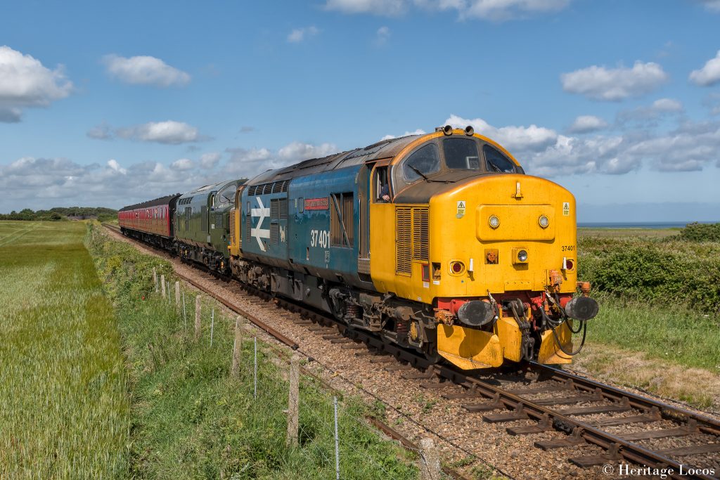 37401 leads D6732 on a Holt to Sheringham service on the North Norfolk Railway Mixed Traffic Gala.